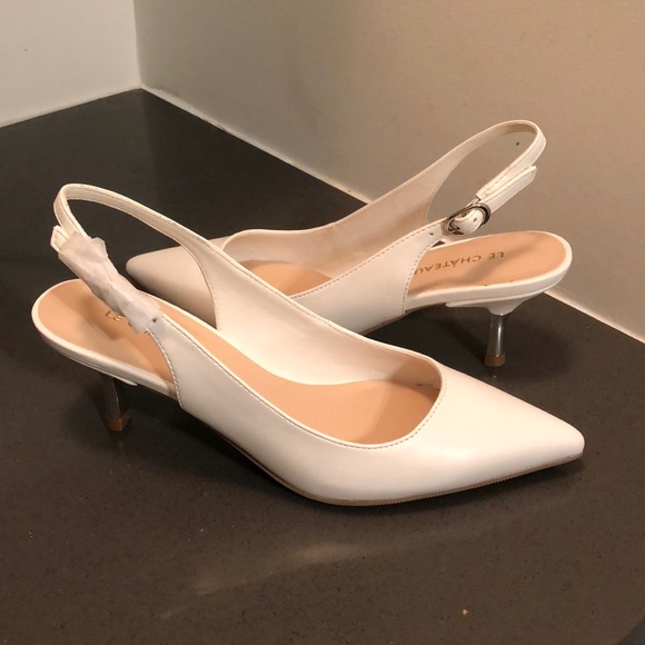 White sling back pumps with silver 1.5” heels - Picture 1 of 1